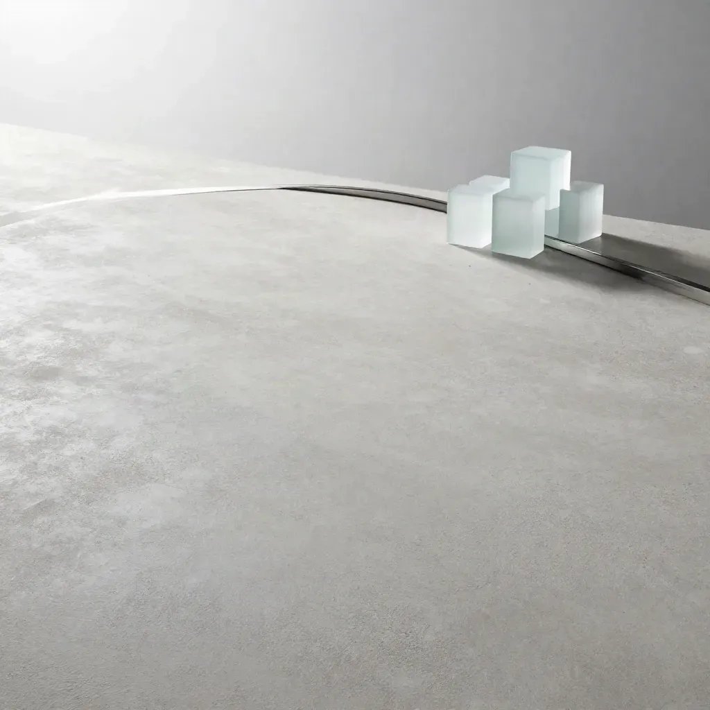 Pale concrete background with silver light, frosted glass forms, and open copy space for pricing.
